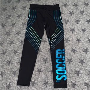 Black Leggings With Green And Blue Design
